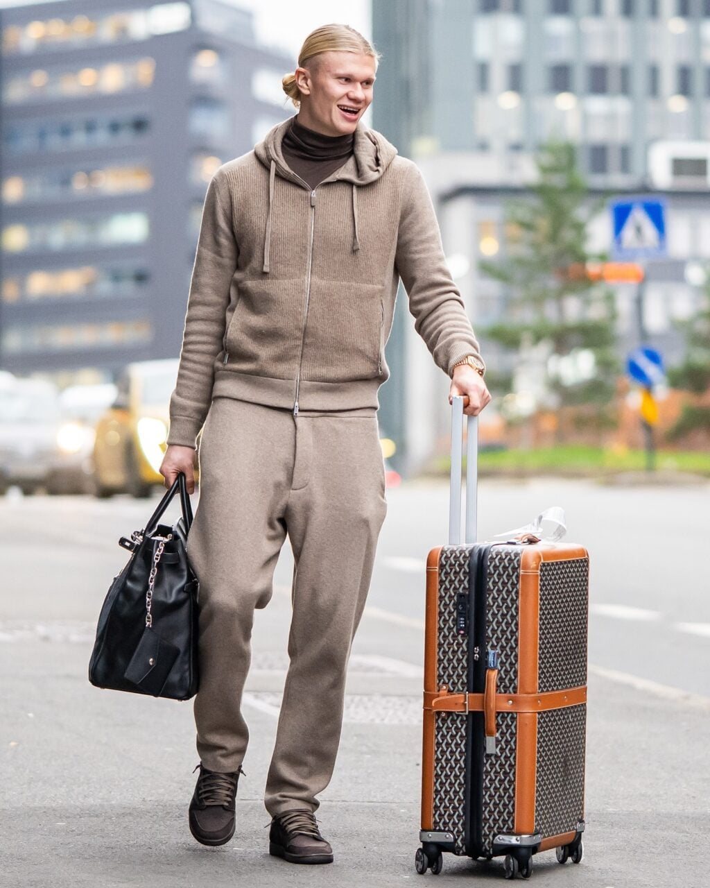 Hermès HAC 40 Rock junto a una maleta Goyard Satolas GM